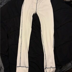 SKIMS White Leggings with blue Stitching.
